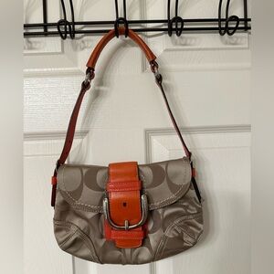Small Coach hobo hand bag. Tan canvas and apricot leather